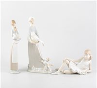Lot 33 - Lladro figure, girl and a lamb, 27cm