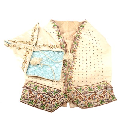 Lot 275 - A Russian pre 1910 embroidered waist coat and handkerchief case.