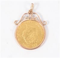 Lot 200B - A George III Half Sovereign 1818 in a 9 carat yellow gold scroll top mount, gross weight approximately 5.1gms.