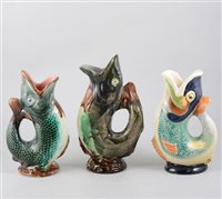 Lot 88 - Pottery gurgling fish jug