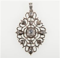 Lot 250 - A white metal pendant set with ten old rose cut diamonds, open scroll work, navette shaped 40mm x 26mm, unmarked, white metal testing as silver.