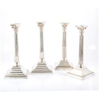 Lot 161 - A matched set of four Victorian Corinthian column candlesticks