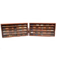Lot 310 - Two model display cabinets with forty nine white metal model Jaguar cars by various makers