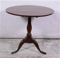 Lot 391 - Victorian oak occasional table, circular tilt top, turned baluster columns, tripod legs, diameter 81cm, height 77cm.