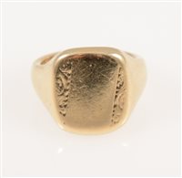 Lot 233 - A 9 carat yellow gold signet ring, the rectangular head 17mm x 13mm having a scroll engraved pattern to each side, ring size Q, approximate weight 14.7gms.