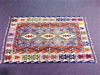 Lot 430 - A large Kilim rug