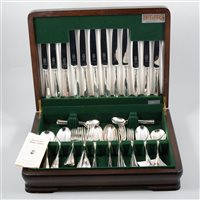 Lot 89 - An electroplated canteen by Butler, six place settings, mahogany effect box.