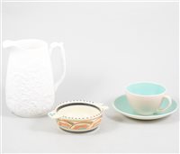 Lot 43 - Poole twin tone pottery teaware