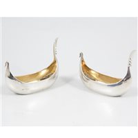 Lot 360 - A pair of silver boat-shaped salts by Holland, Aldwinckle & Slater, London 1906