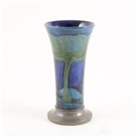Lot 529 - William Moorcroft for Liberty & Co, Moonlit Blue, a flared vase with Tudric pewter base.