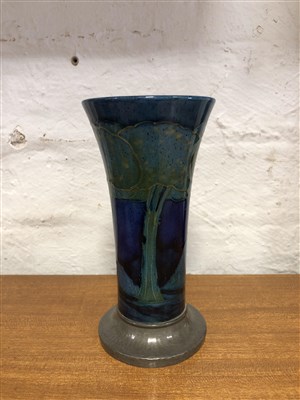 Lot 529 - William Moorcroft for Liberty & Co, Moonlit Blue, a flared vase with Tudric pewter base.