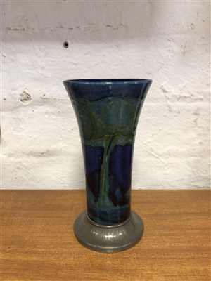 Lot 529 - William Moorcroft for Liberty & Co, Moonlit Blue, a flared vase with Tudric pewter base.