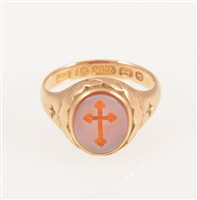 Lot 237 - A 15 carat yellow gold signet ring set with an intaglio carved hardstone with cross motif, hallmarked Birmingham 1914, gross weight approximately 5gms, ring size O.