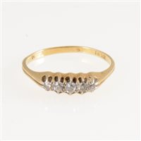 Lot 266 - A diamond five stone ring, the old brilliant cut stones claw set in an all yellow metal mount marked 18ct, approximate weight 2.8gms, ring size S.