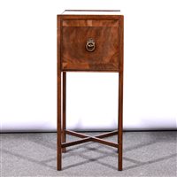 Lot 527 - George III mahogany pot cupboard, slightly recessed square top, fitted with a single door, X-shaped stretchers, width 31cm.