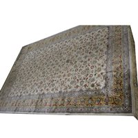 Lot 555 - A large silk rug, floral design on cream ground, multi-bordered, 295cm x 193cm.