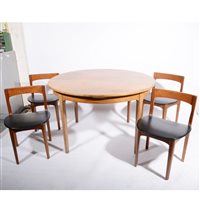 Lot 627 - An extending teak dining table and four chairs by Hans Olsen for Frem Rojle