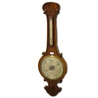Lot 544 - A Victorian walnut banjo shape barometer, silvered dial signed A Molteni, 3 Eyre Street, Hill, Leather Lane, thermometer over, 102cm.