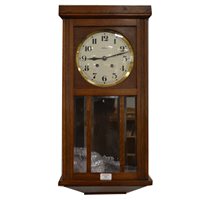 Lot 539 - Oak cased wall clock, silvered dial signed.Vedette, spring driven movement striking on  a gong, 66cm.