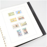 Lot 135 - A collection of stamps covering Guernsey (album with mint stamps, stock book and three envelopes), Alderney and the Channel Islands (1 box)
