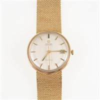 Lot 318 - Omega - a gentleman's 9 carat yellow gold Automatic Geneve wrist watch, circular champagne baton dial with centre seconds hand and date aperture in a 9 carat gold 33mm case