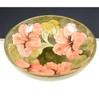 Lot 3 - Moorcroft circular bowl, Hibiscus design with a Royal Warrant label, diameter 26cm.