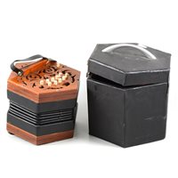 Lot 175 - An Anglo concertina squeezbox by C Jones, twenty-one buttons, pierced mahogany case, travel box