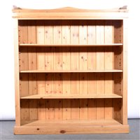 Lot 511 - Pine open bookcase, fitted with four shelves, fluted uprights, plinth base, width 145cm, height 165cm.