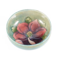 Lot 32 - Small Moorcroft circular bowl, Clematis design, diameter 8cm.