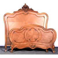 Lot 373 - French walnut bedstead.