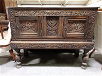 Lot 488 - Oak dole cupboard, in part 18th Century, two panelled doors, turned supports, width 127cm, height 99cm.