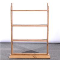 Lot 513 - Pine wall shelf unit, three heights under a cornice piece, width 80cm.
