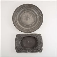Lot 522 - A Tudric pewter butter dish, designed by Archibald Knox for Liberty & Co; and a pewter plate by Kayserzinn.