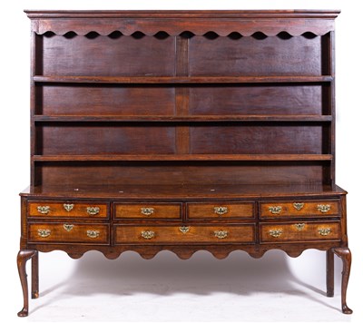 Lot 453 - A George III and later oak dresser