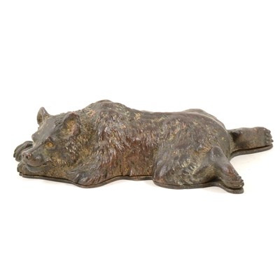 Lot 152 - Bronzed and gilt metal novelty desk-top stamp box, designed as a sleeping bear, length 15cm.