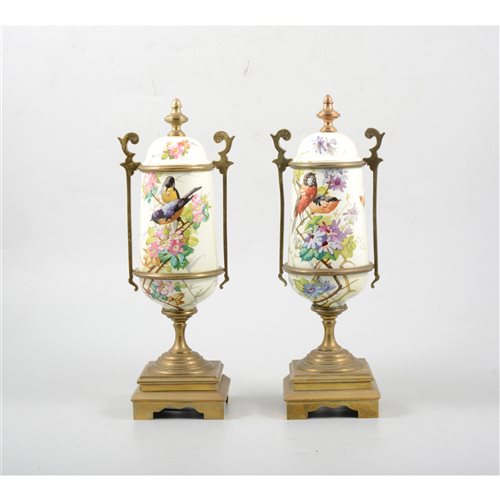 Lot 17 - Pair of French gilt metal and painted enamel garniture urns.