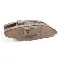 Lot 109 - A trench art metal tank, approximately. 34cm.