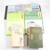 Lot 173 - Large leather bound family bible with brass clips and edges, and two copies of Mrs Beeton's cookery books.