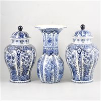 Lot 74 - A pair of Delft pattern covered vases by Boch, a similar vase, and other ceramics.