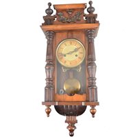 Lot 92 - Small Vienna type wall clock, beech case, the movement striking on a gong, approximately 56cm.