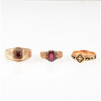 Lot 240 - Three vintage gold rings, a gentleman's 9 carat yellow gold signet ring set with a round brilliant cut garnet, gross weight approximately 6.1gms