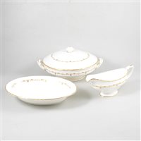 Lot 78 - A Royal Worcester dinner service, Gold Chantilly pattern.
