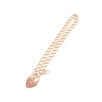 Lot 271 - A 9 carat rose gold solid curb link bracelet, 5.2mm wide, fitted with a padlock fastener, approximate weight 13.1gms.