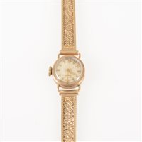 Lot 296 - Longines - a lady's 9 carat yellow gold bracelet watch, circular light champagne baton dial in a 9 carat yellow gold 14mm case fitted with a 9 carat gold milanese bracelet