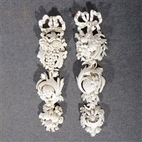 Lot 94 - A pair of carved and painted beechwood fruit pendants, ..