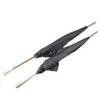 Lot 178 - Two black umbrellas, with silver mounts.