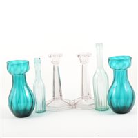 Lot 36 - A collection of decorative glass bottles, cod bottle, pair of Stuart crystal squat glass candlesticks, three pairs of coloured glass hyacinth vases