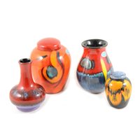 Lot 1 - A Poole Pottery 16cm orange ground "Peacock" design ginger jar number 125463, a 12cm blue ground ginger jar, a 16cm "Infusion" design Venetian vase number 197070