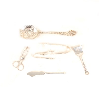 Lot 144 - Victorian silver serving spoon, bright-cut and engraved Martin Hall & Co., Sheffield1894; silver bread fork; small silver cutlery; sugar tongs and servers.