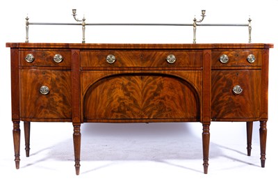 Lot 445 - A George III mahogany breakfront sideboard